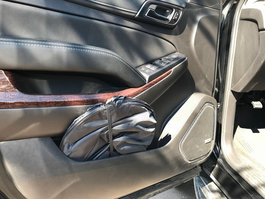 OC Sun Shade Stored in door pocket of GMC Suburban